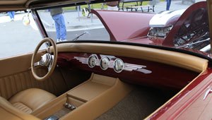 Tan interior and dashboard of the custom 1932 Ford Phaeton